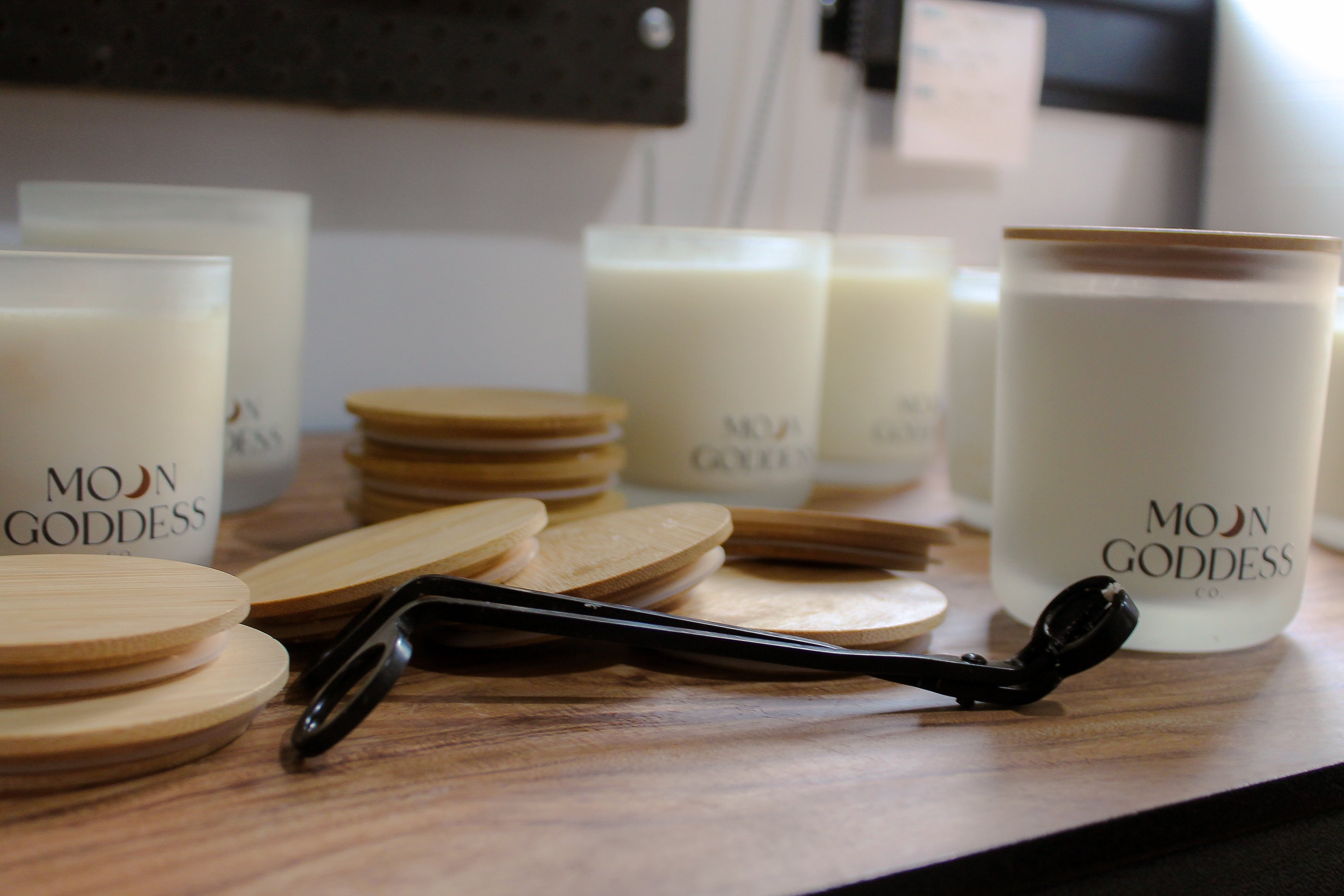 Candles with wooden lids and 'Moon Goddess' branding